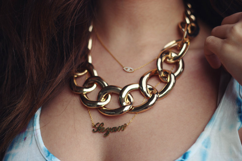 4. transparent chain necklace with leopard print coat and colorful sneakers
